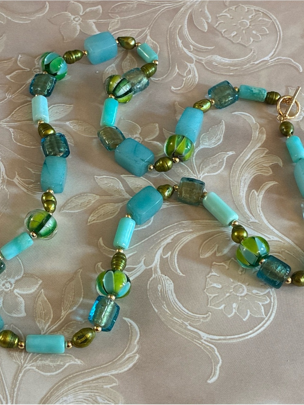 Hand crafted necklace with stone, pearl, and art glass beads in aqua and green - Picture 3 of 7